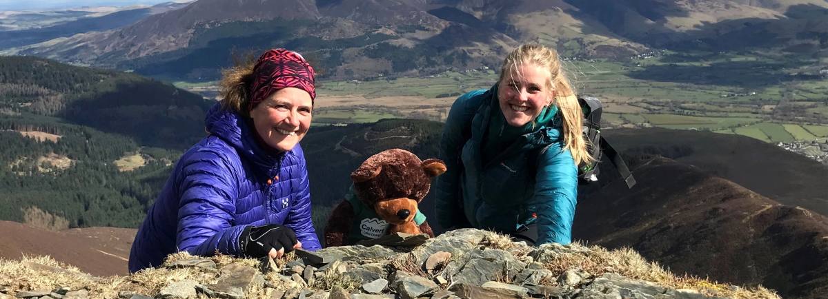 Helen Hunt, (who has planned, set up and will lead the Rotary 5 Peaks Challenge), together with Rosie Cumella, a member of the Calvert Lakes Fund raising staff, and also in the challenge team, on a training exercise with Calvert Bear