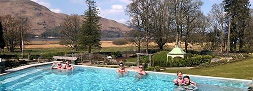 Some of the first spa goers enjoying sunshine, blue skies and amazing views from the outdoor swimming pool.