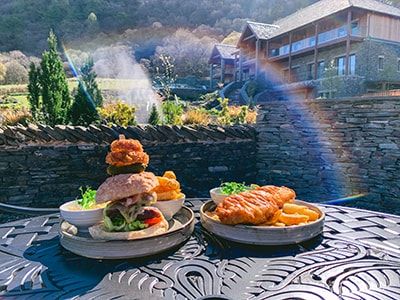 The Mighty Burger and the Local Cider Battered Fish & Chips, two of the most popular dishes available on the Lodore Falls Hotel & Spa outdoor dining menus