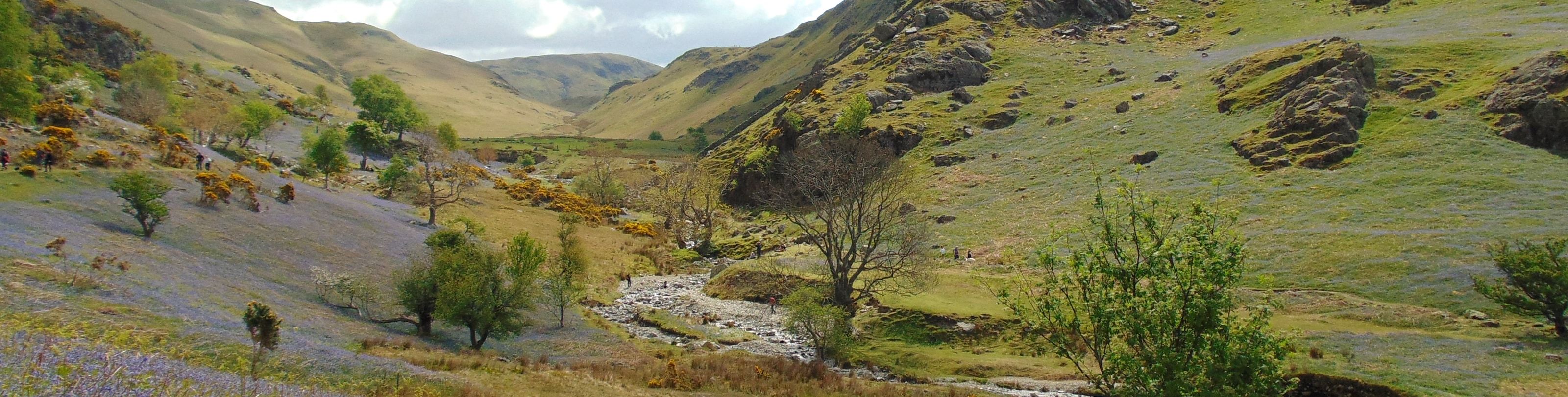 The narrow Rannerdale valley running back between steep grassy fells