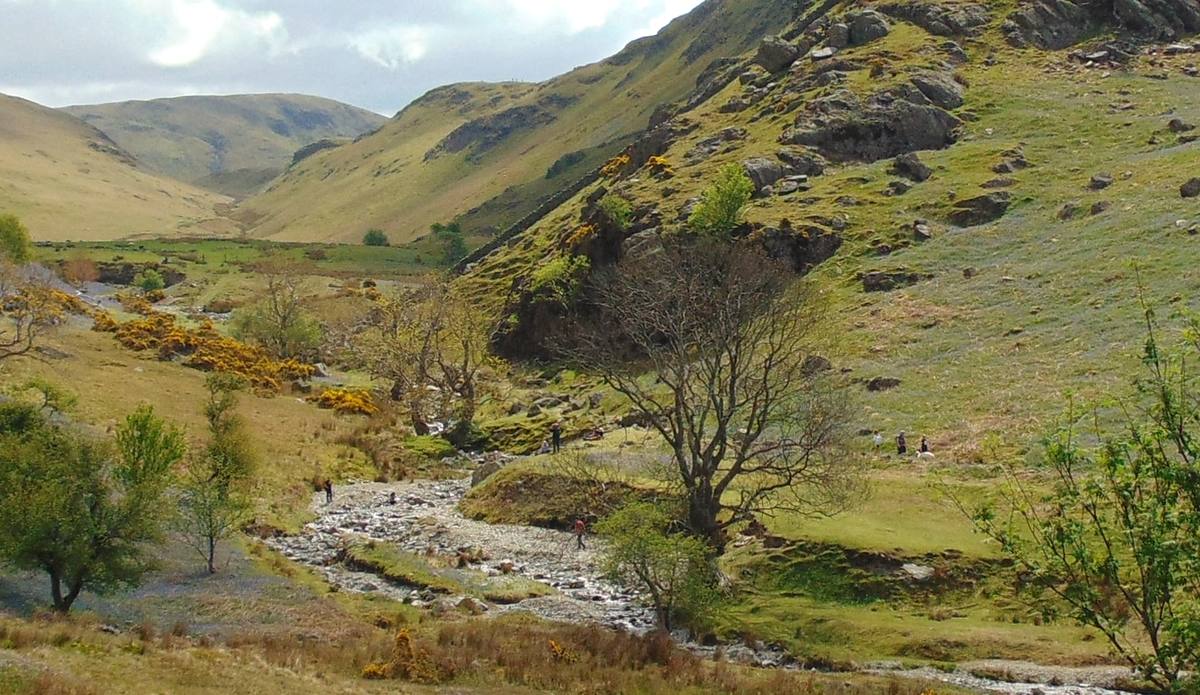 The narrow Rannerdale valley running back between steep grassy fells