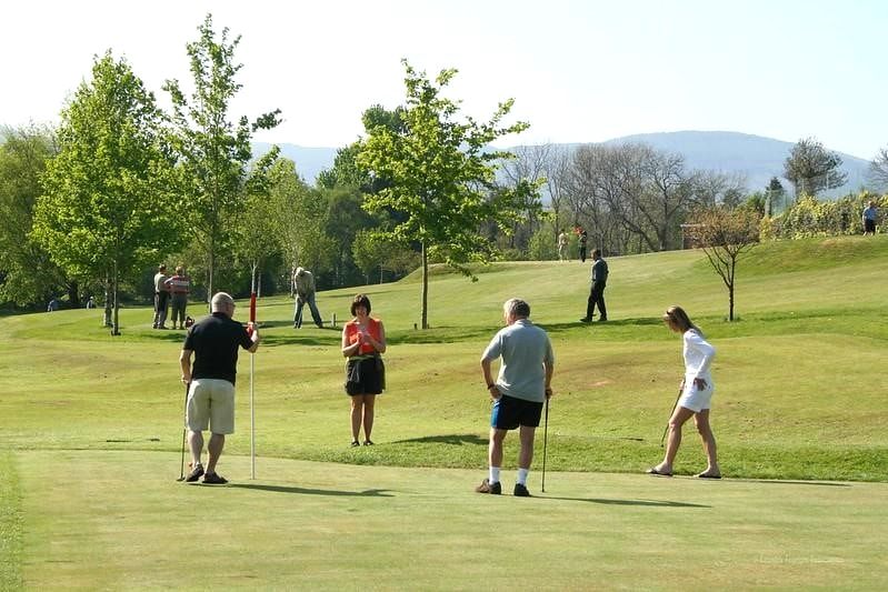 Playing pitch and putt in Hope Park