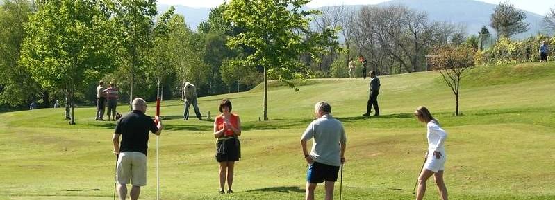 Playing pitch and putt in Hope Park