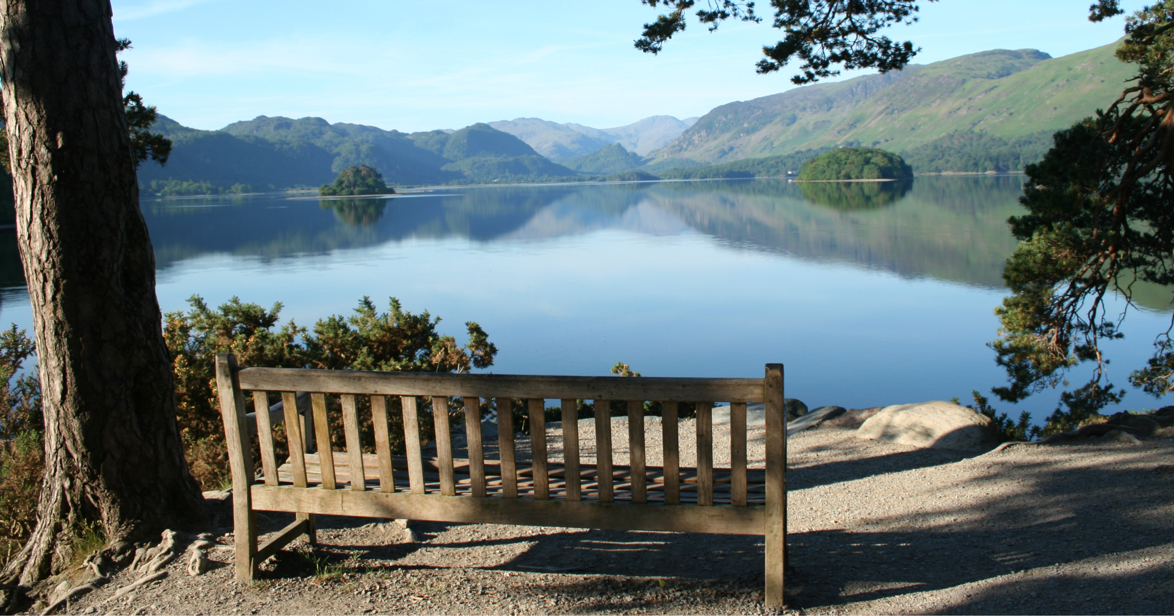 Derwentwater lying still with the fells reflected seen from Friars Crag