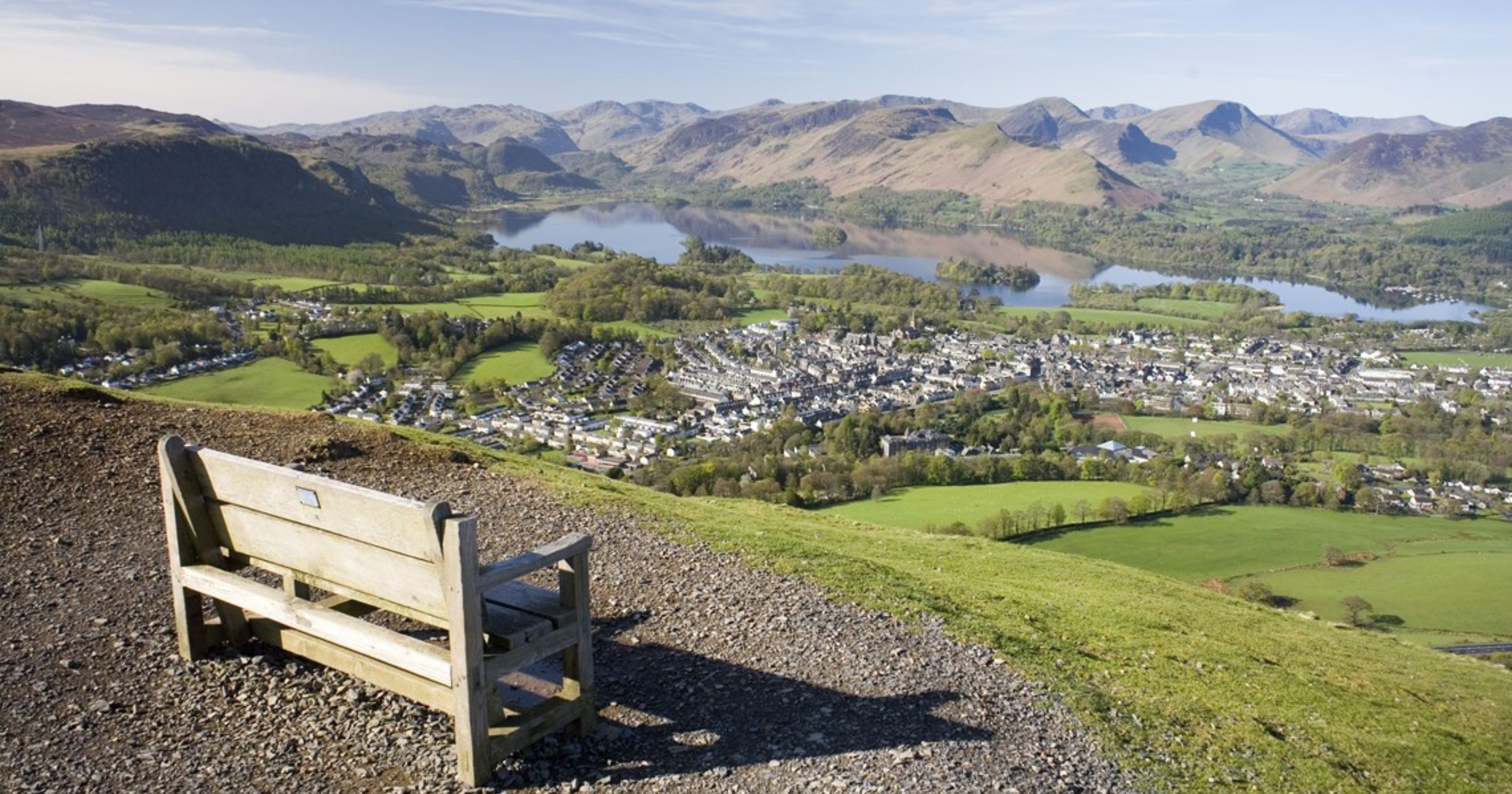 Bench on the summit of Latrigg overlooking Keswick, derwentwater (large lake) and the surrounding mountains 