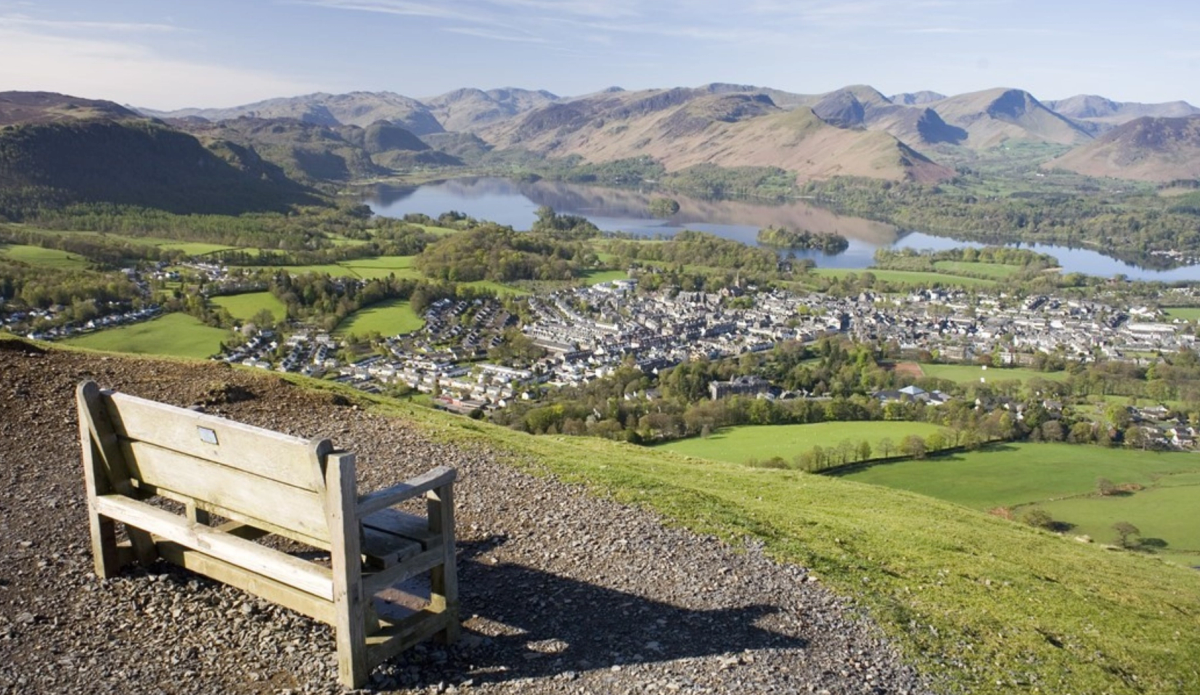 Bench on the summit of Latrigg overlooking Keswick, derwentwater (large lake) and the surrounding mountains
