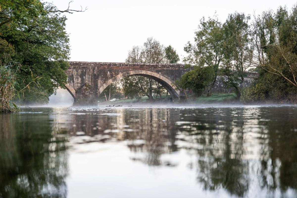 stone bridge over a river