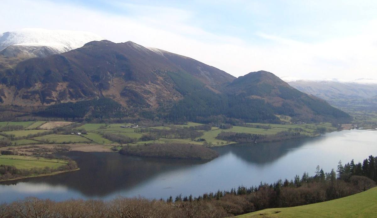 Bassenthwaite Lake laid out below the grassy slopes of Sale Fell