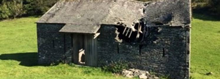Arklid Barn, Nibthwaite, before repairs. Between 2019 and 2022, 10 barns were conserved as part of a government-funded pilot project jointly managed by Historic England and Natural England, with the Lake District National Park Authority leading delivery.
