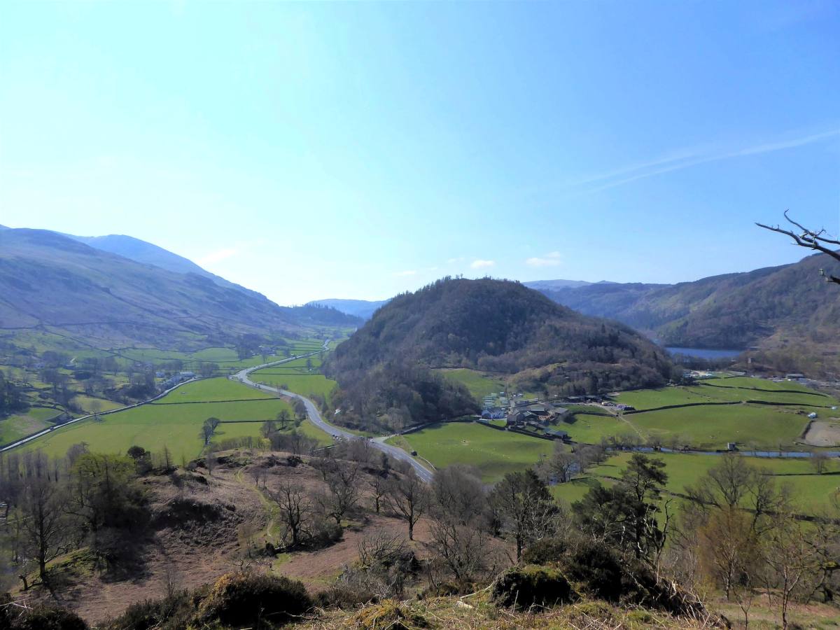The length of St Johns in the Vale seen from high on the fell with the valley road below