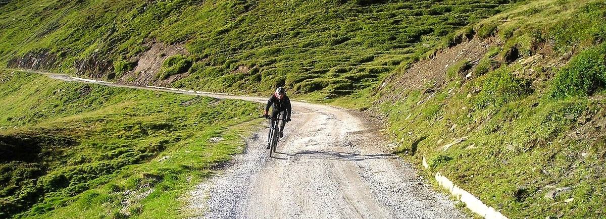 Cyclist on gravel track