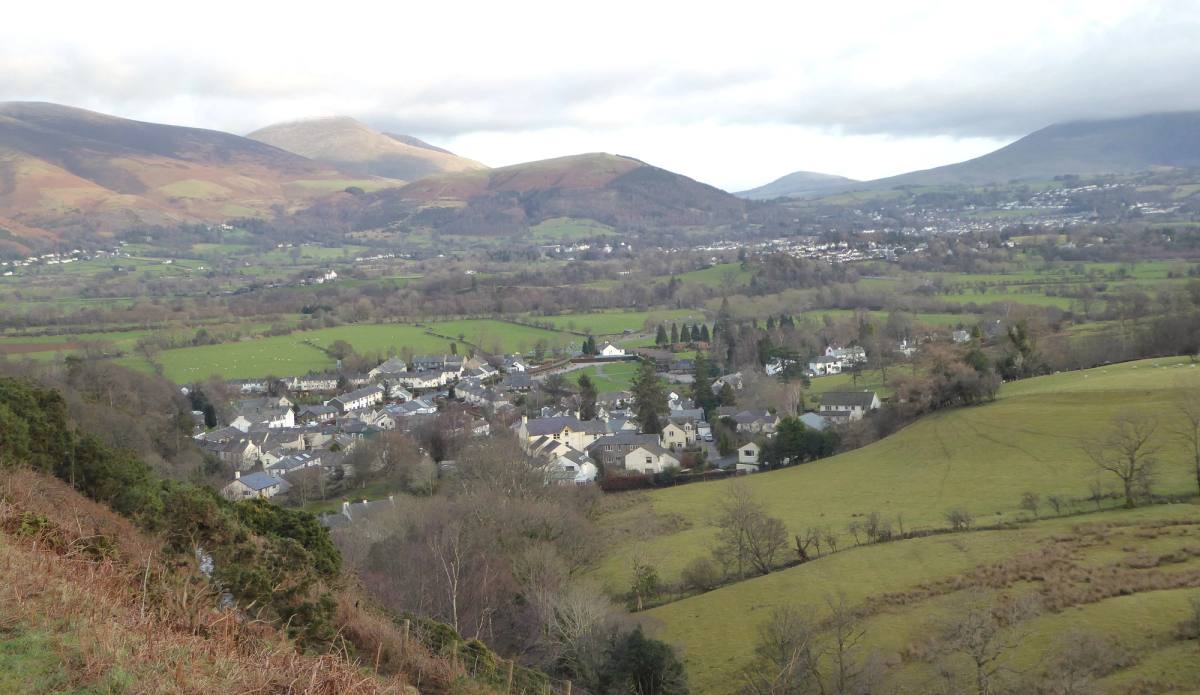 Keswick and the vale seen from the fellside with cloud shadow moving across