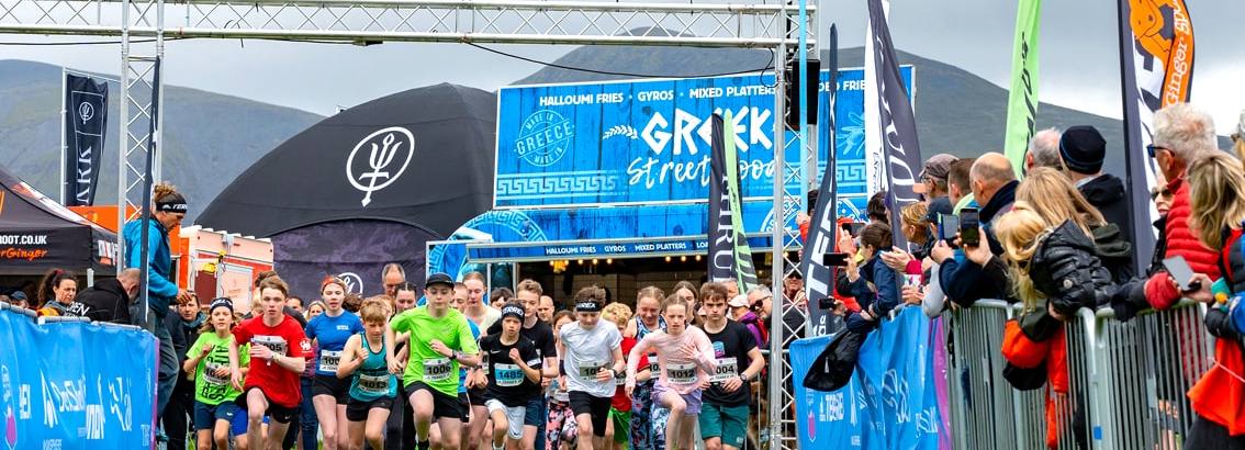 Young runners start a race at kmf