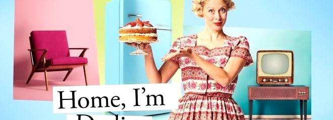Woman in 1950's outfit holding a cake, promo poster for Home I'm Darling
