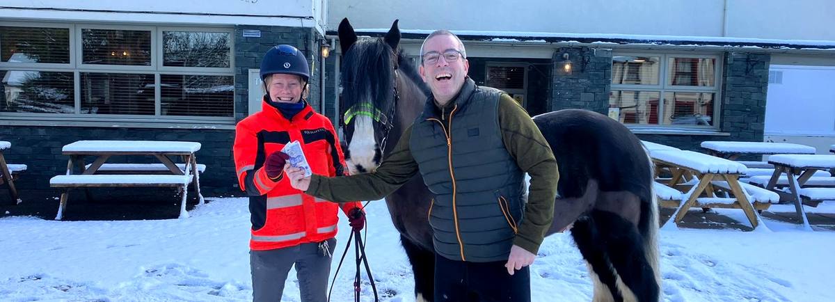Lou Hogan, Riding Instructor at Calvert Lakes Stables, with Justin Farnan at the TWA Dogs