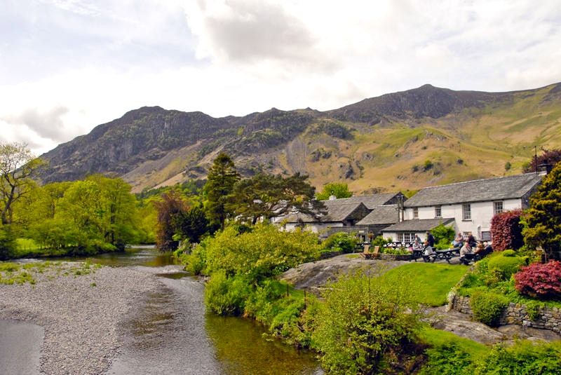 The river running past the cottages and gardens of Grange in Borrowdale