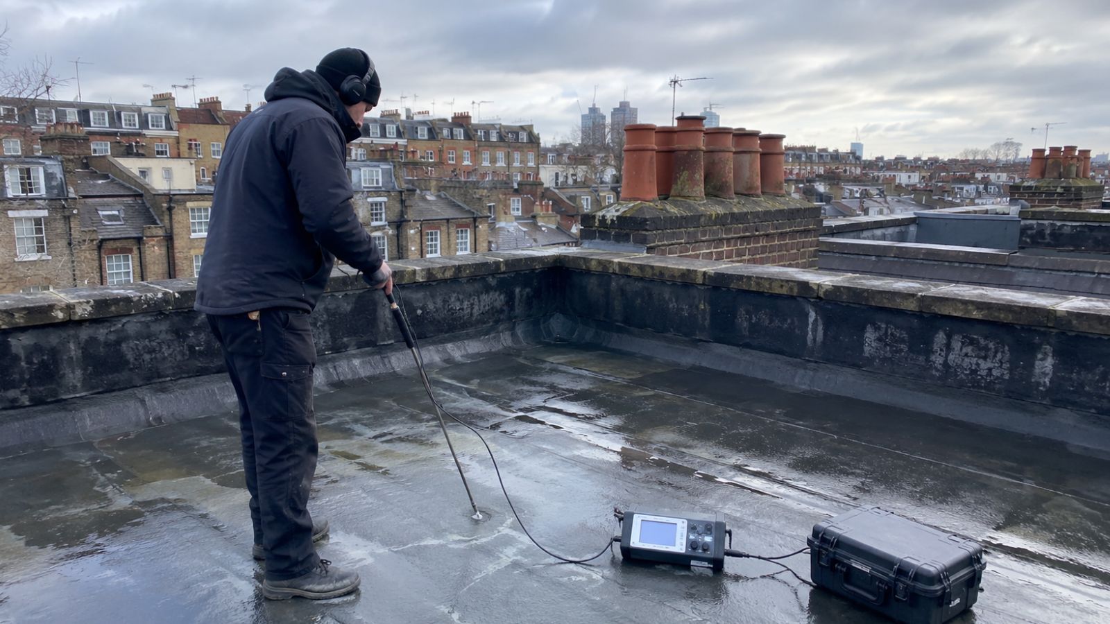 Clear Flow engineer carrying out flat roof leak detection in Hammersmith & Fulham, London