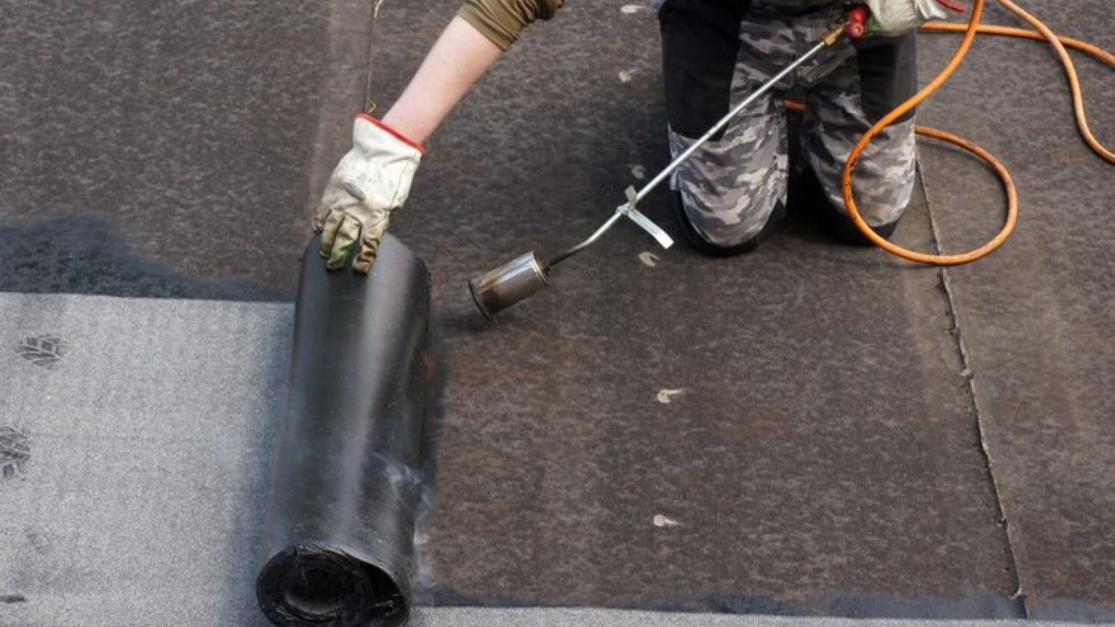 Clear Flow engineer carrying out flat roof leak detection in Greenwich, London