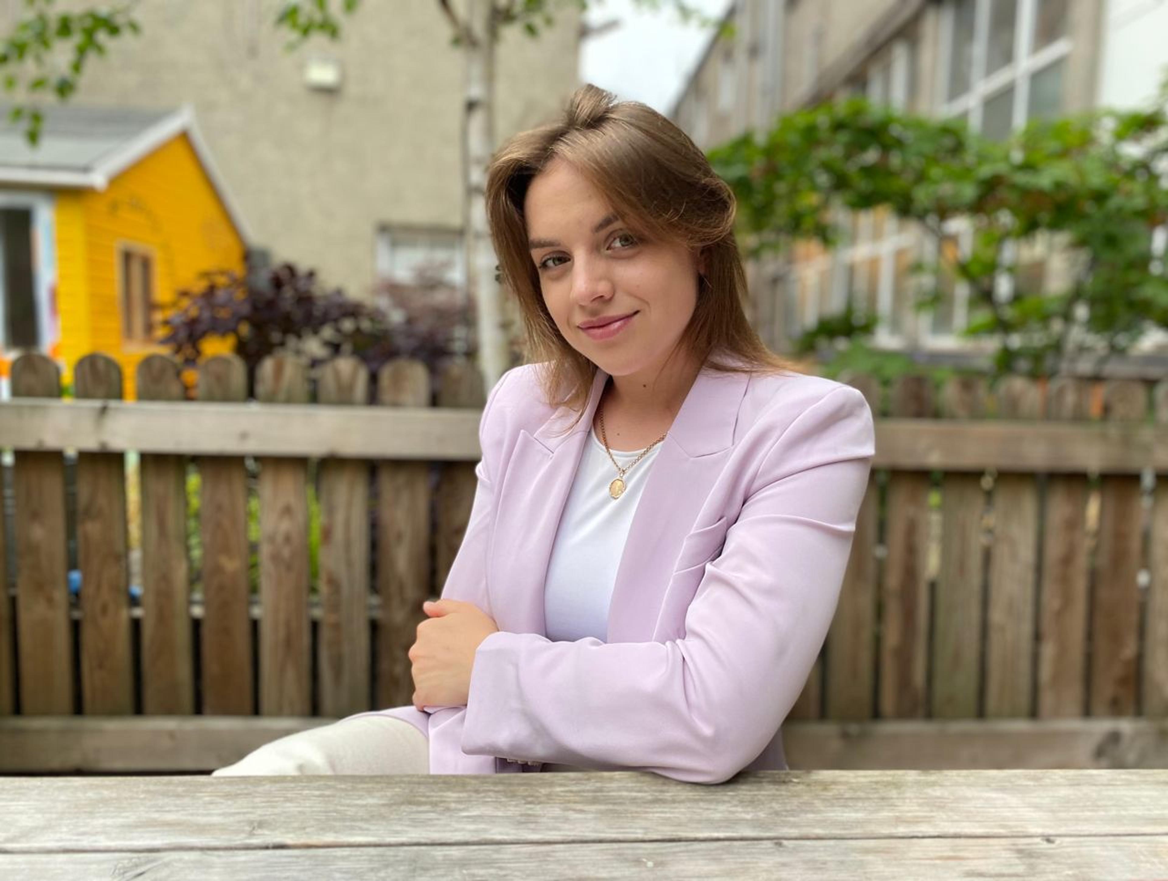 Woman in pink jacket