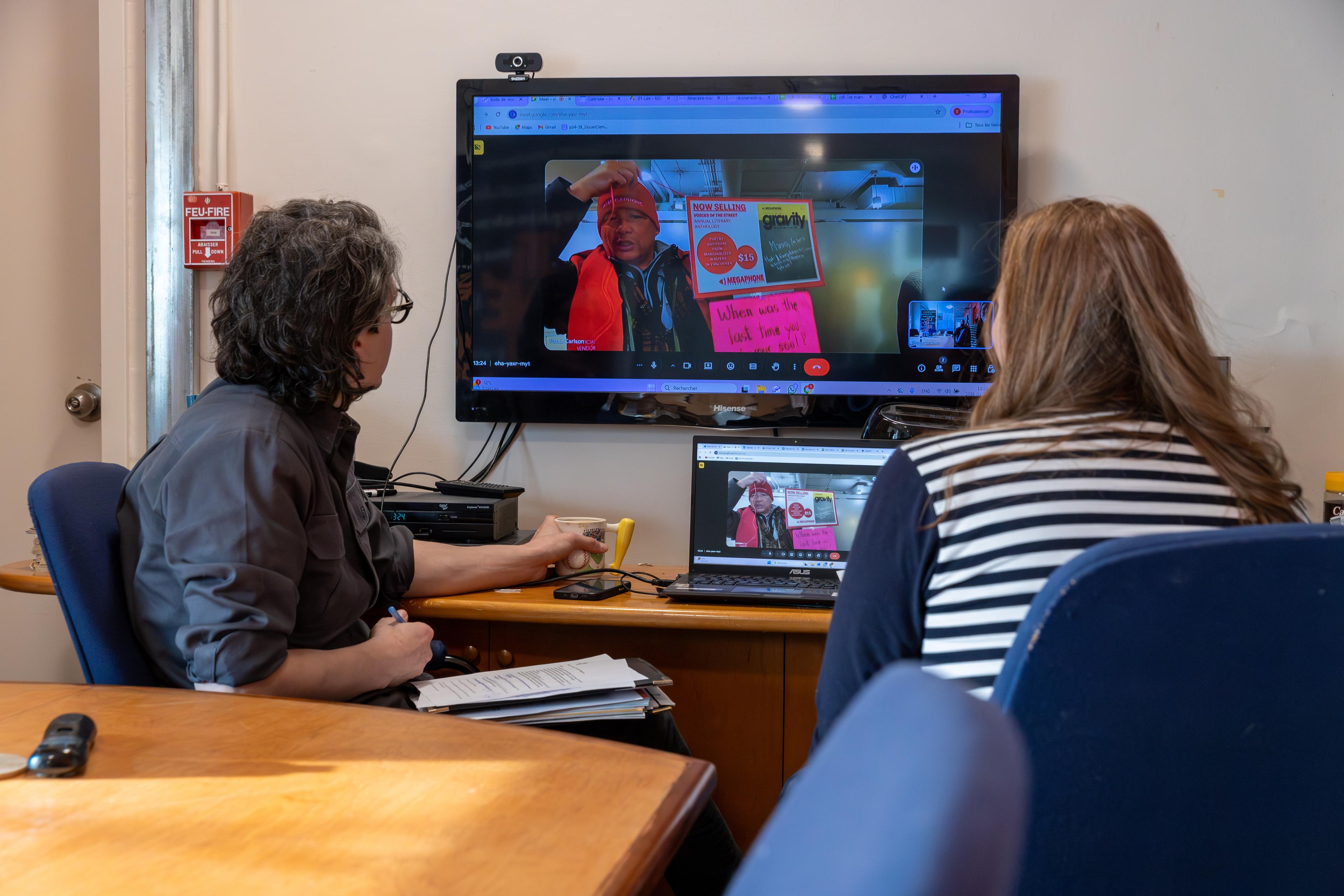 L’Itinéraire vendor Lynn Champagne and Megaphone vendor David Deocera talk via video call