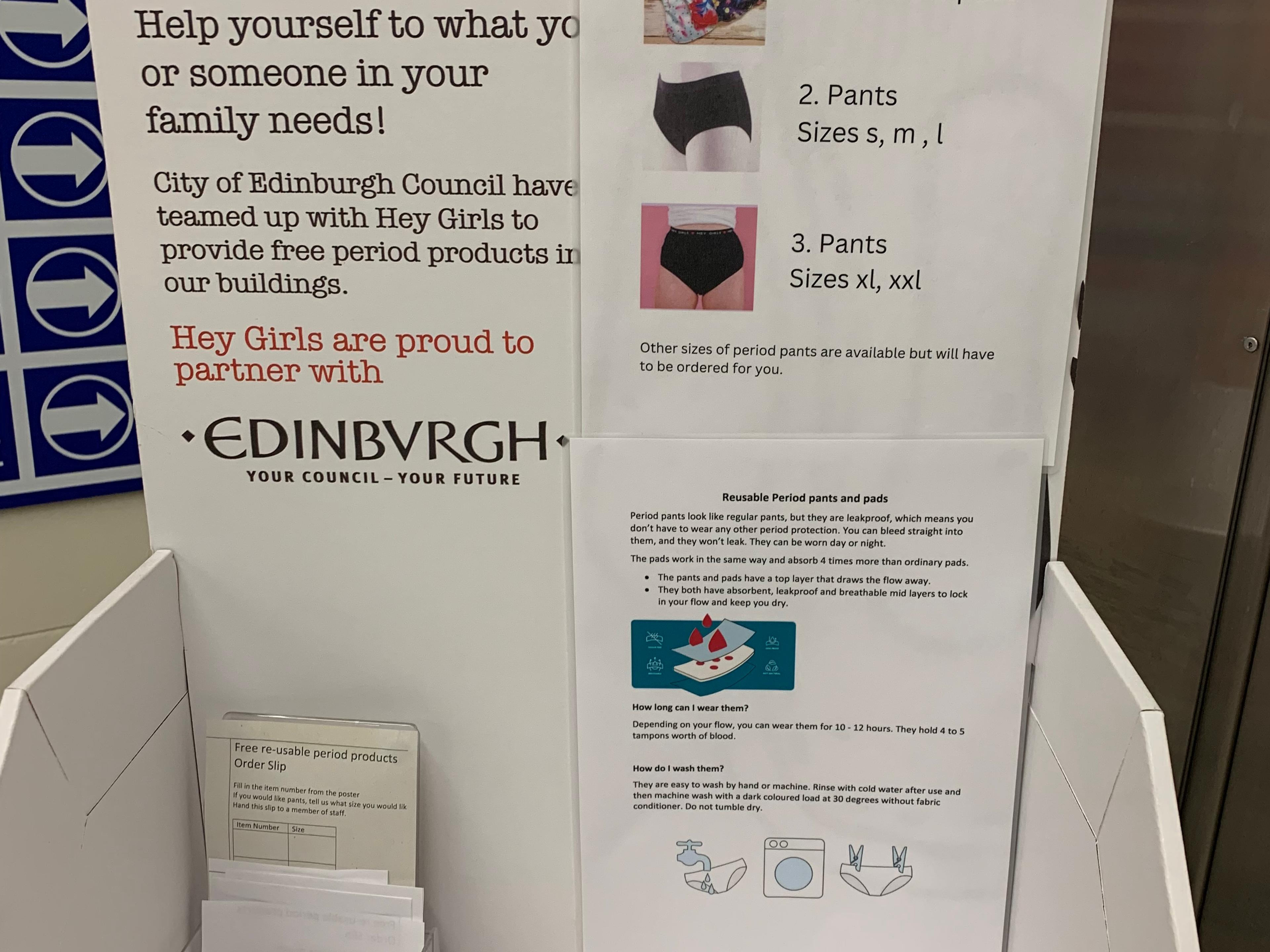 An empty stand at Edinburgh library where free period products are placed for use by the public