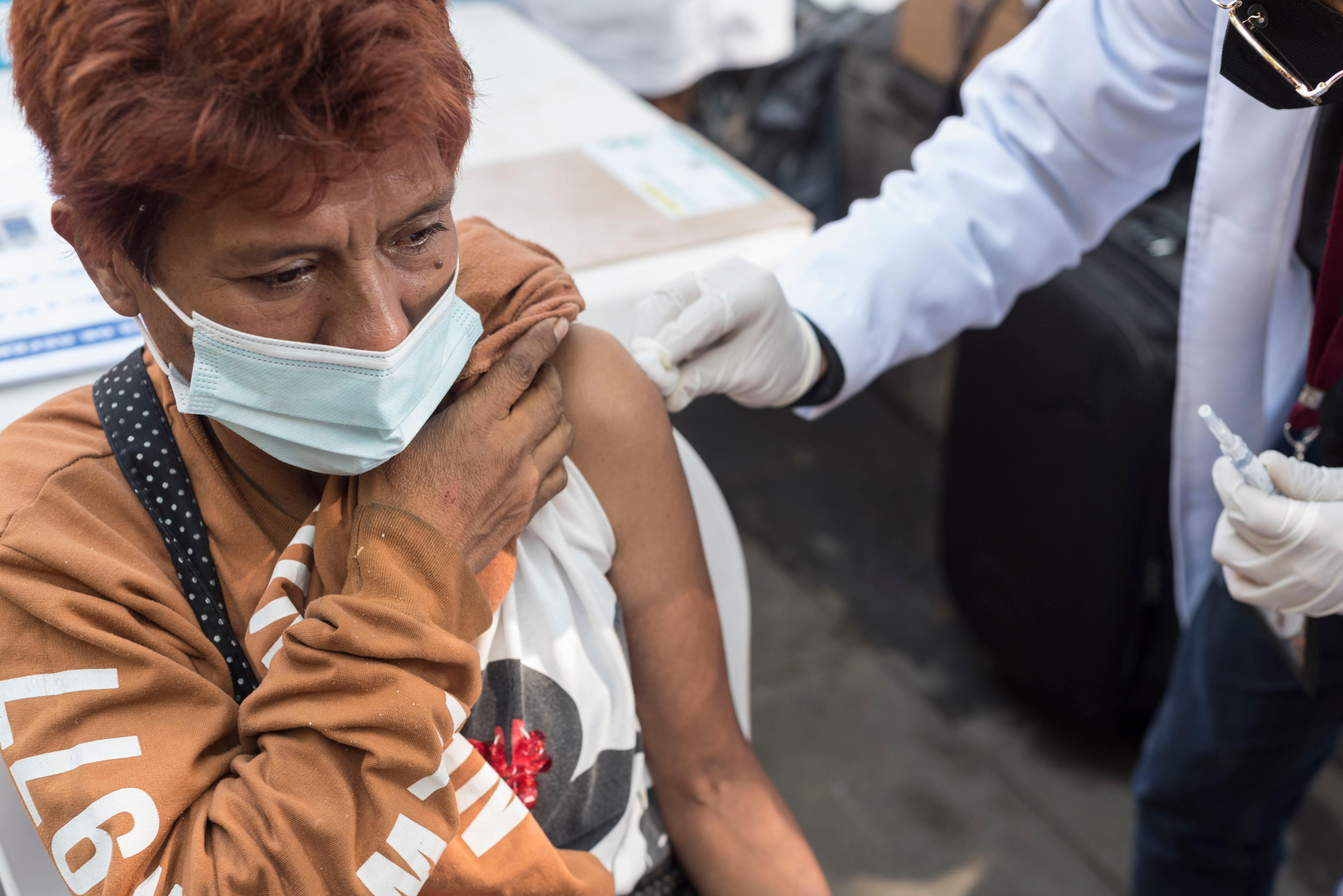 Woman getting vaccinated in Mexico