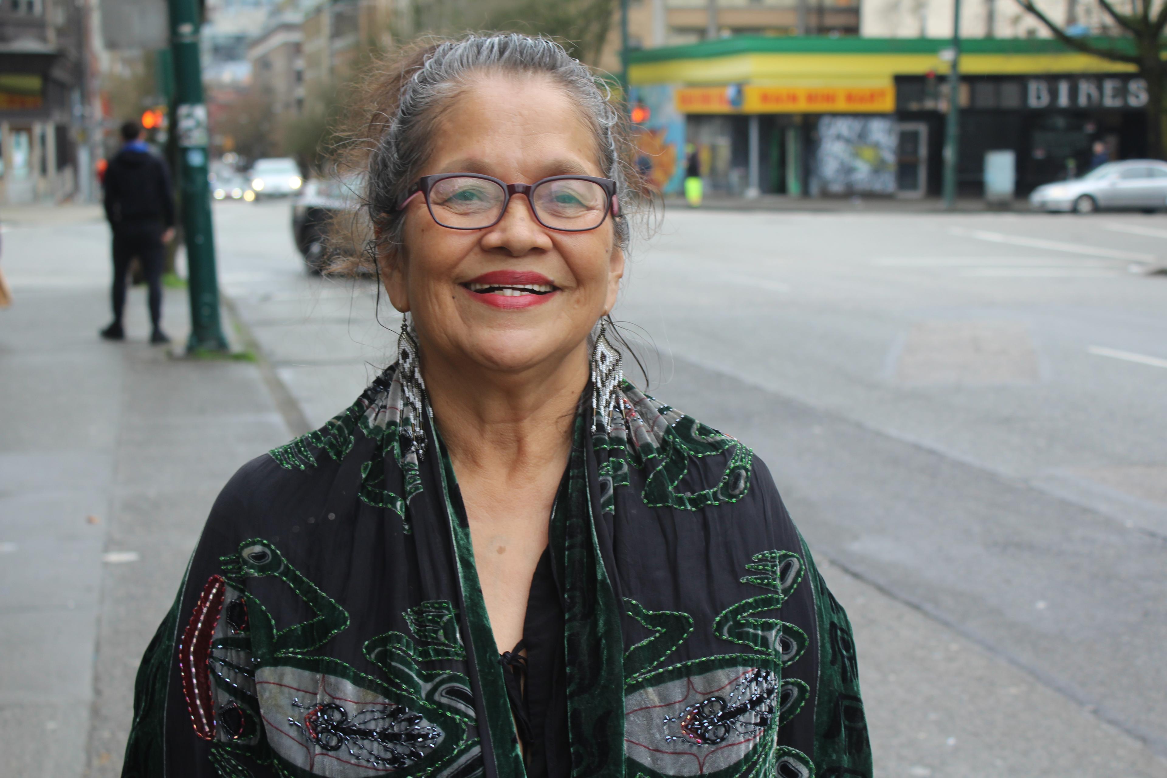 Yvonne Mark wearing glasses and smiling