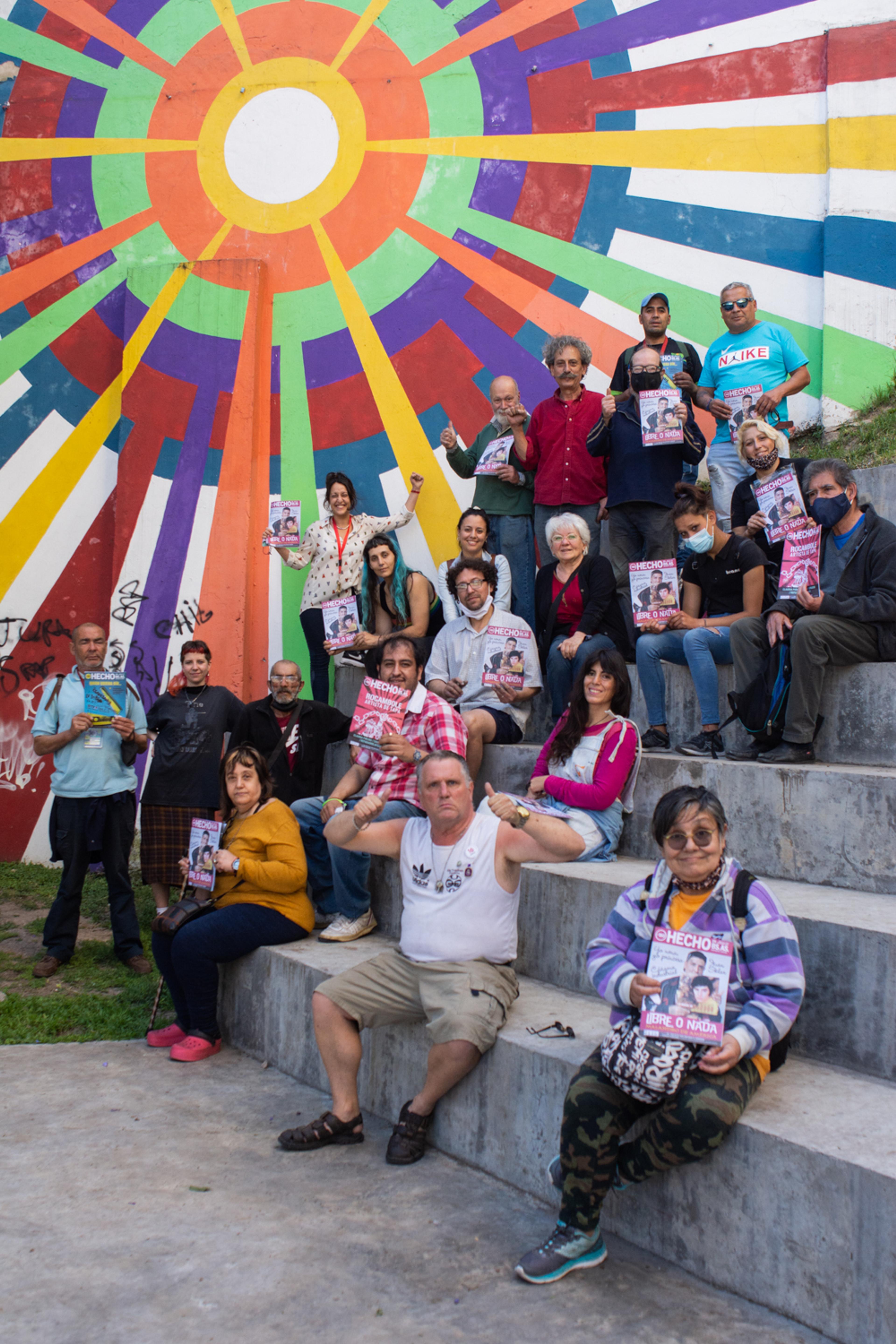 Group of people holding Hecho en Bs. As. in Argentina