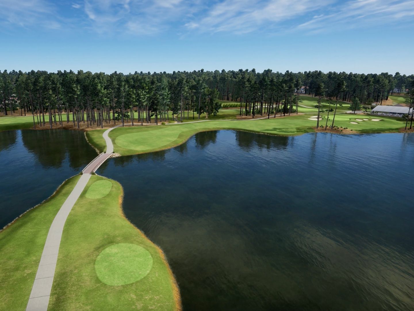 Aerial view of a MacGregor Downs Cary golf course featuring a bridge over a lake, surrounded by dense pine trees.