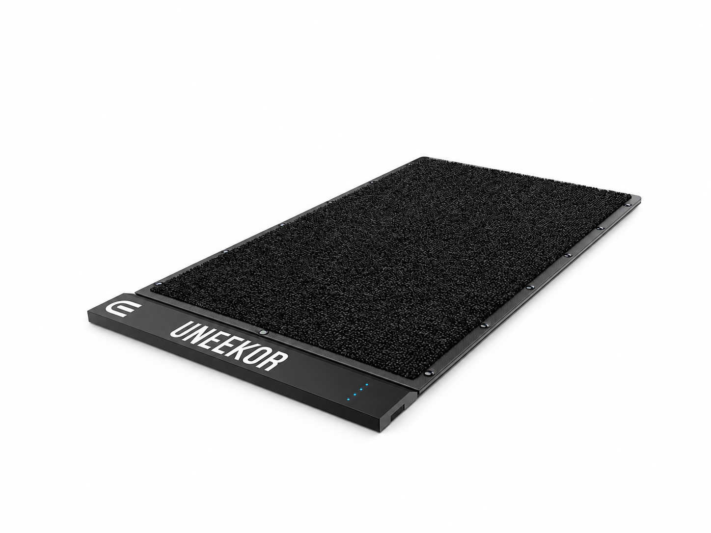 Black Uneekor golf simulator mat with textured surface and blue lights.