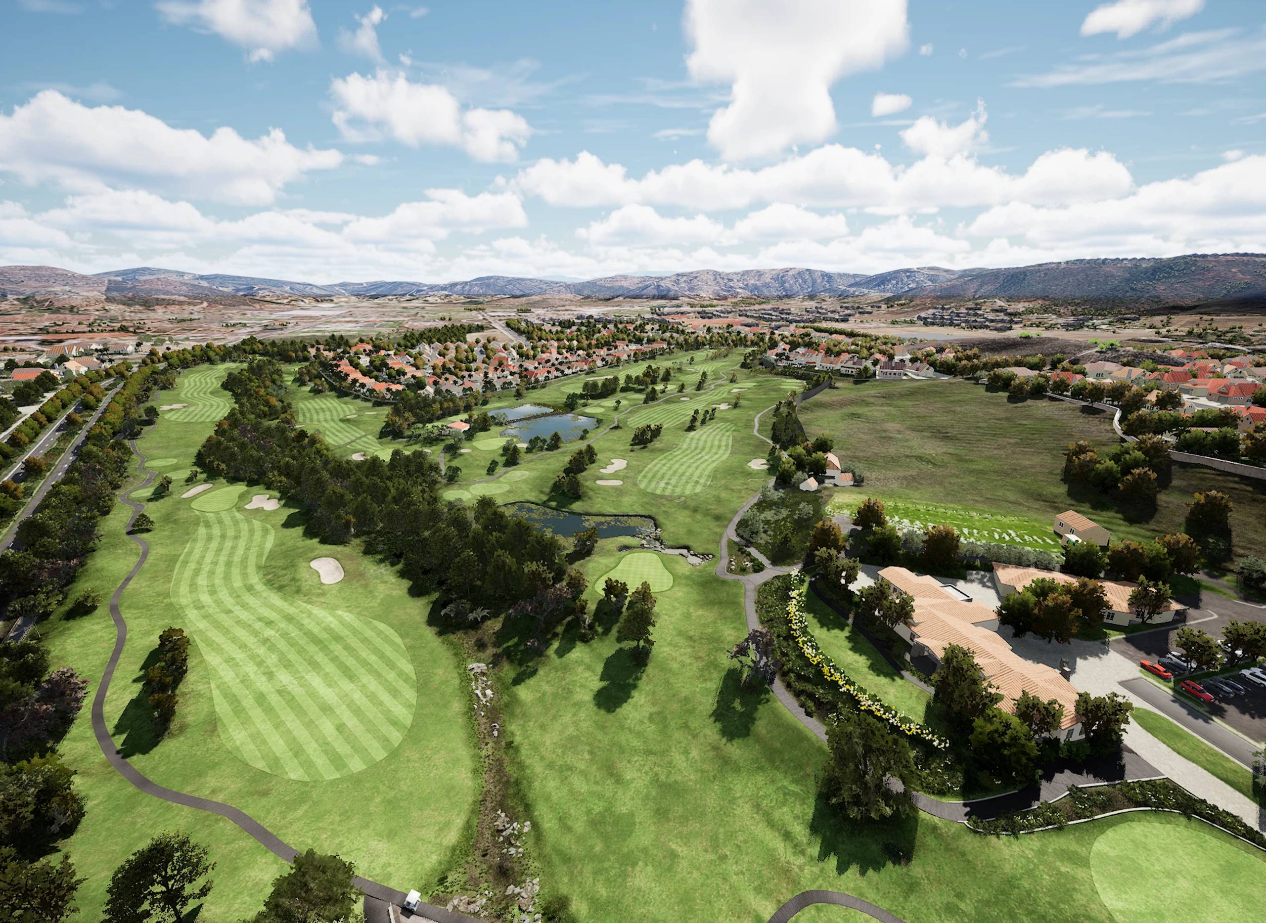 Aerial view of a large golf course with residential areas, lakes, and distant hills under a partly cloudy sky.