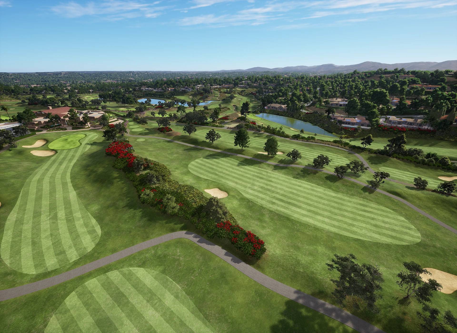 Aerial view of a lush golf course with fairways, bunkers, water hazards, and residential buildings.