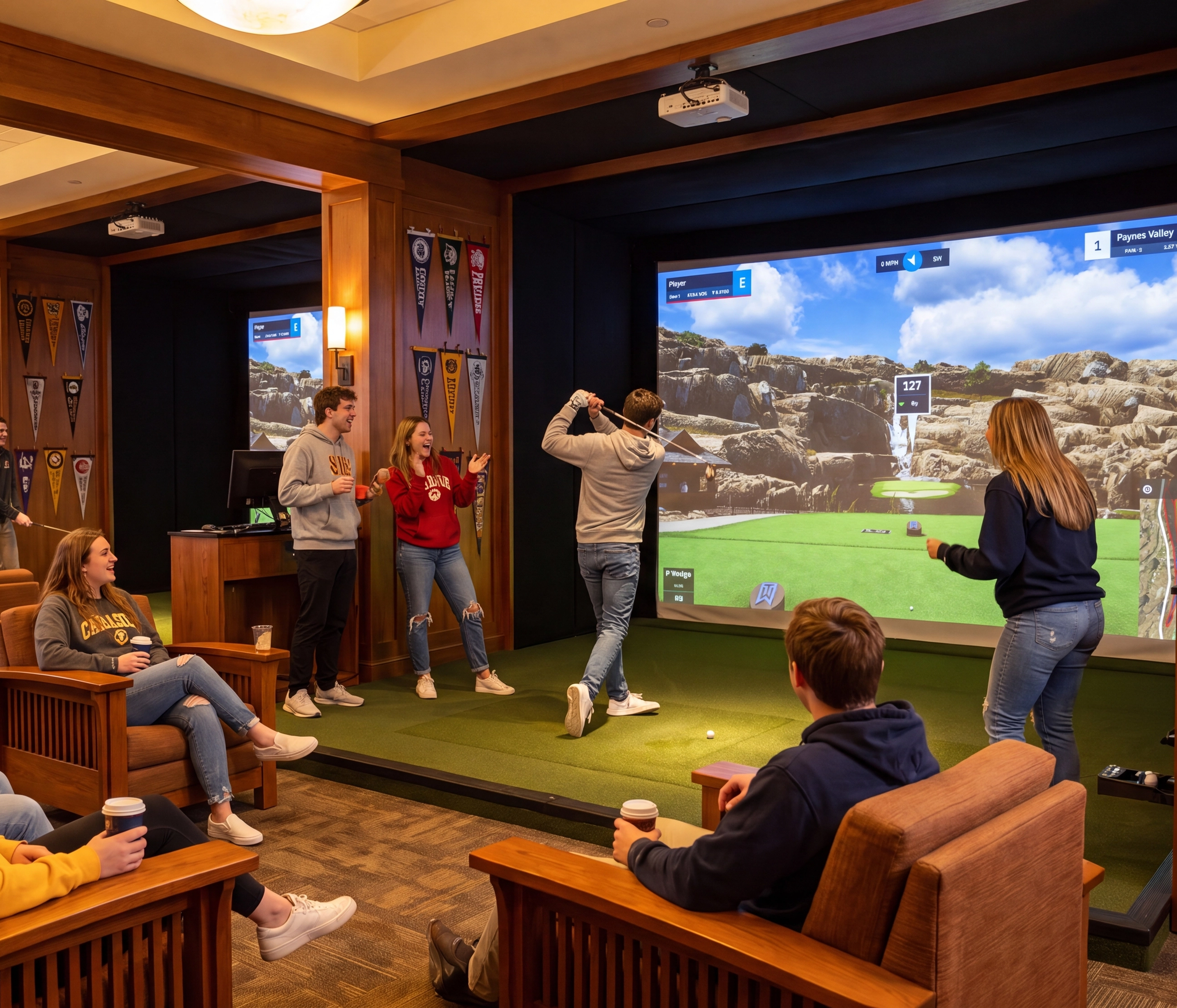 Young adults socializing and playing golf on a large simulator in a modern lounge.