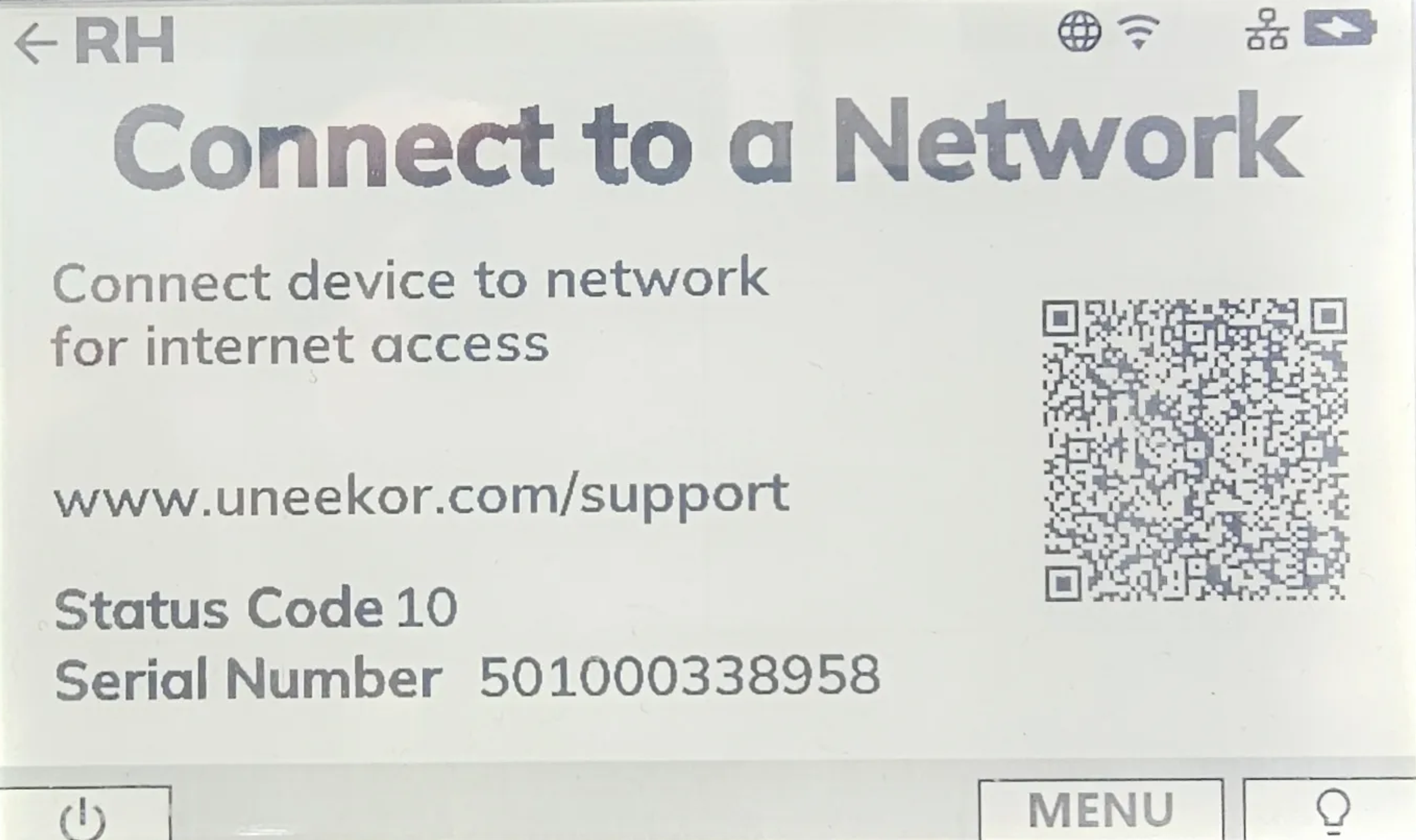 A white screen displaying "Connect to a Network" instructions, a QR code, uneekor.com support URL, Status Code 10, and Serial Number 501000338958.