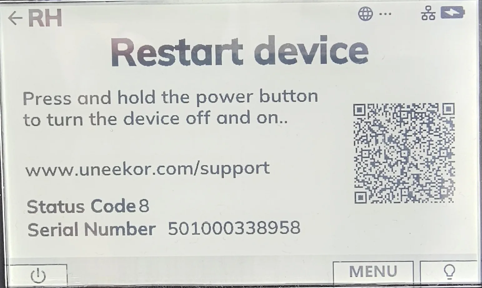A device screen displaying "Restart device" instructions, a QR code, Uneekor support URL, Status Code 8, and Serial Number 501000338958.