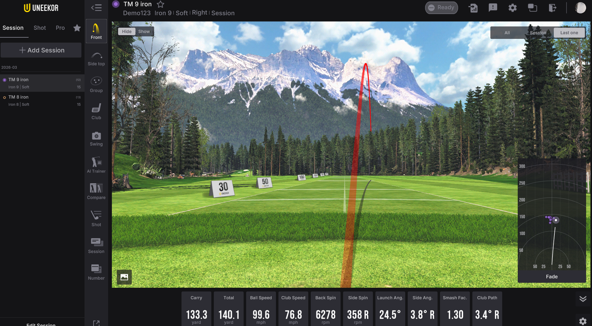 Golf simulator screen displaying a golf shot's trajectory over a virtual driving range with performance data.