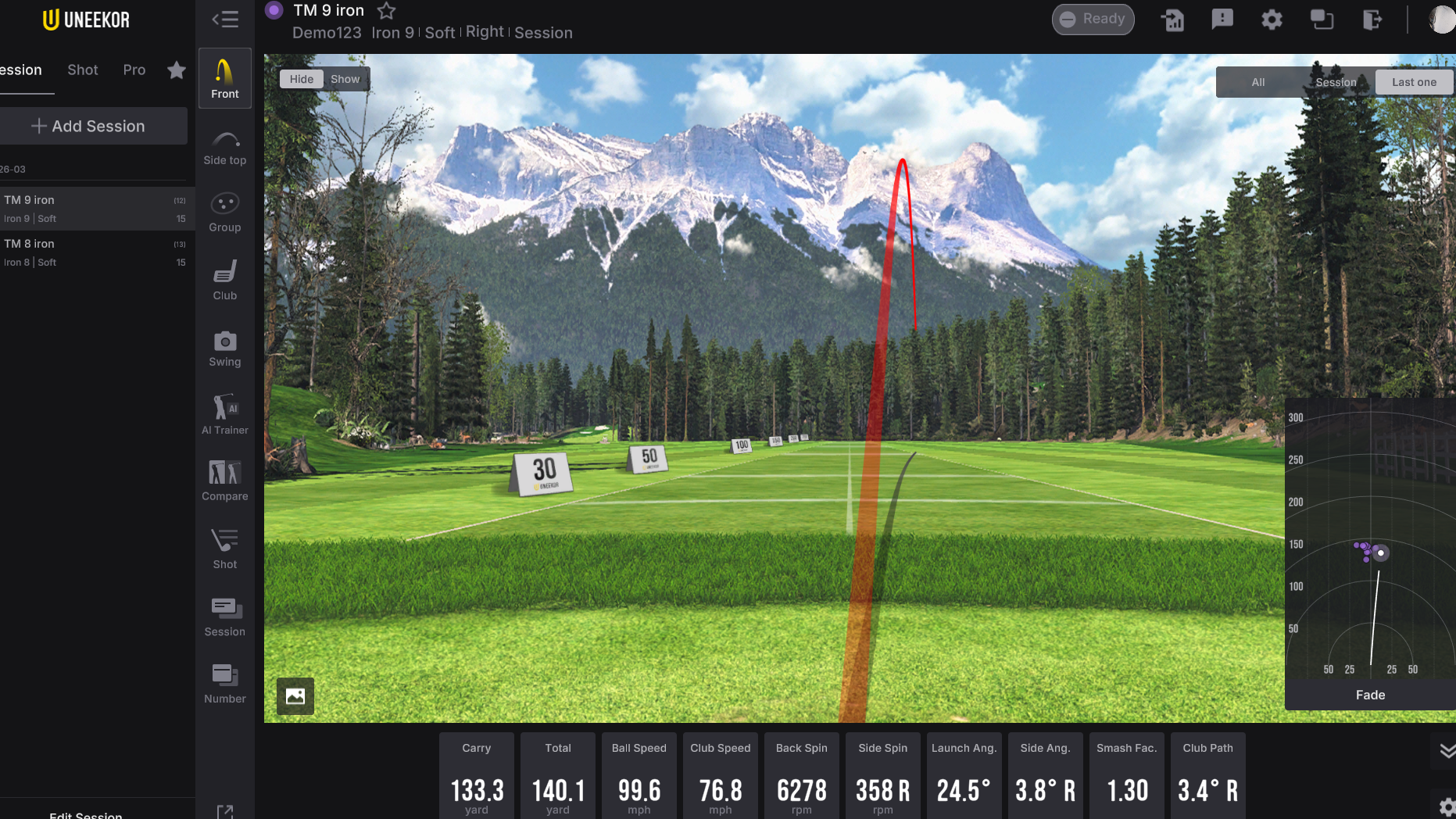 A golf simulator screen displays a virtual course with mountains, showing a red ball flight path and detailed performance metrics at the bottom.