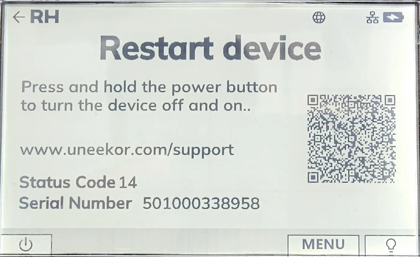 A screen displaying "Restart device" instructions: "Press and hold the power button to turn the device off and on..". Also shows uneekor.com/support, Status Code 14, Serial Number 501000338958, and a QR code.