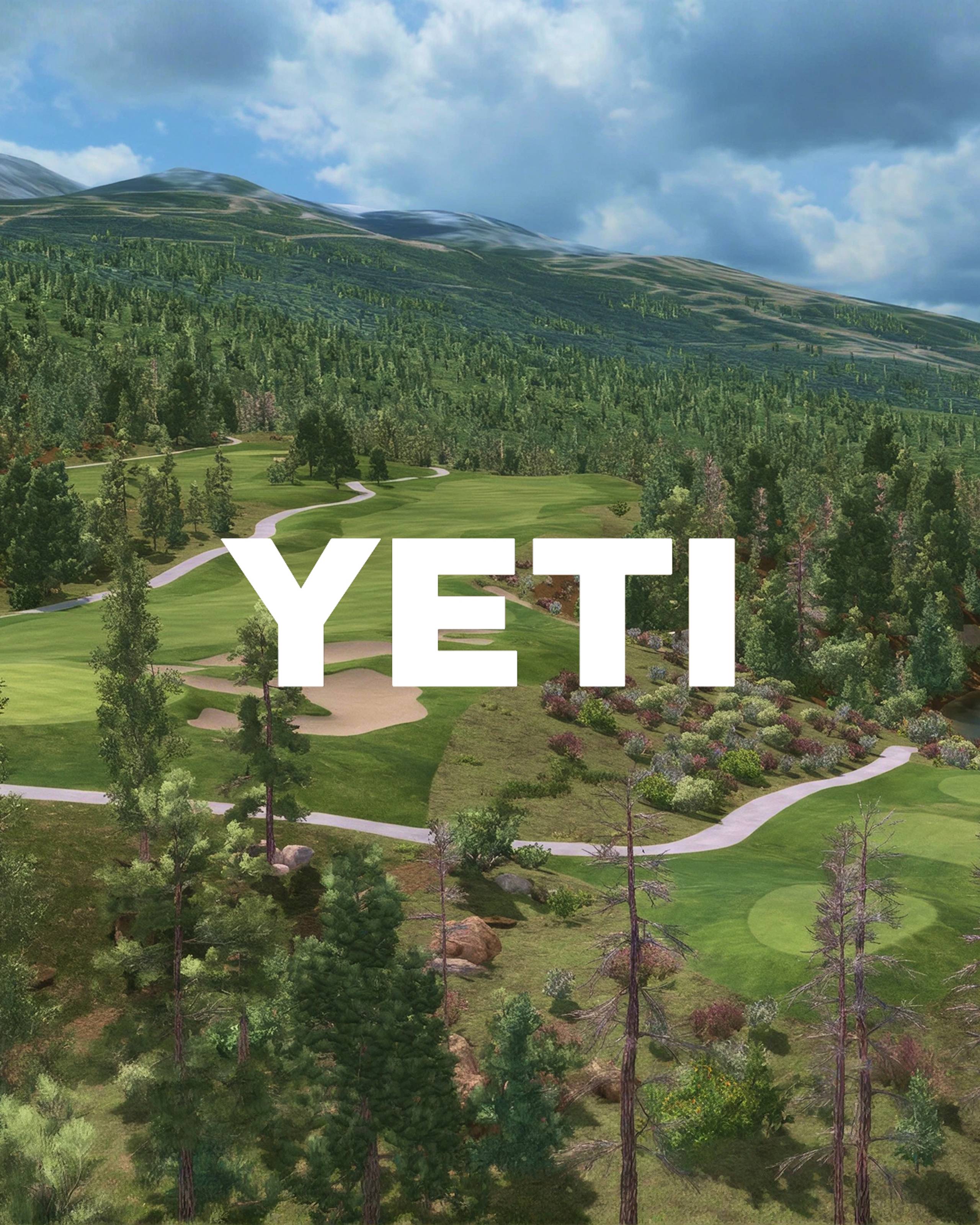 White YETI text superimposed on a golf course surrounded by forests and mountains.