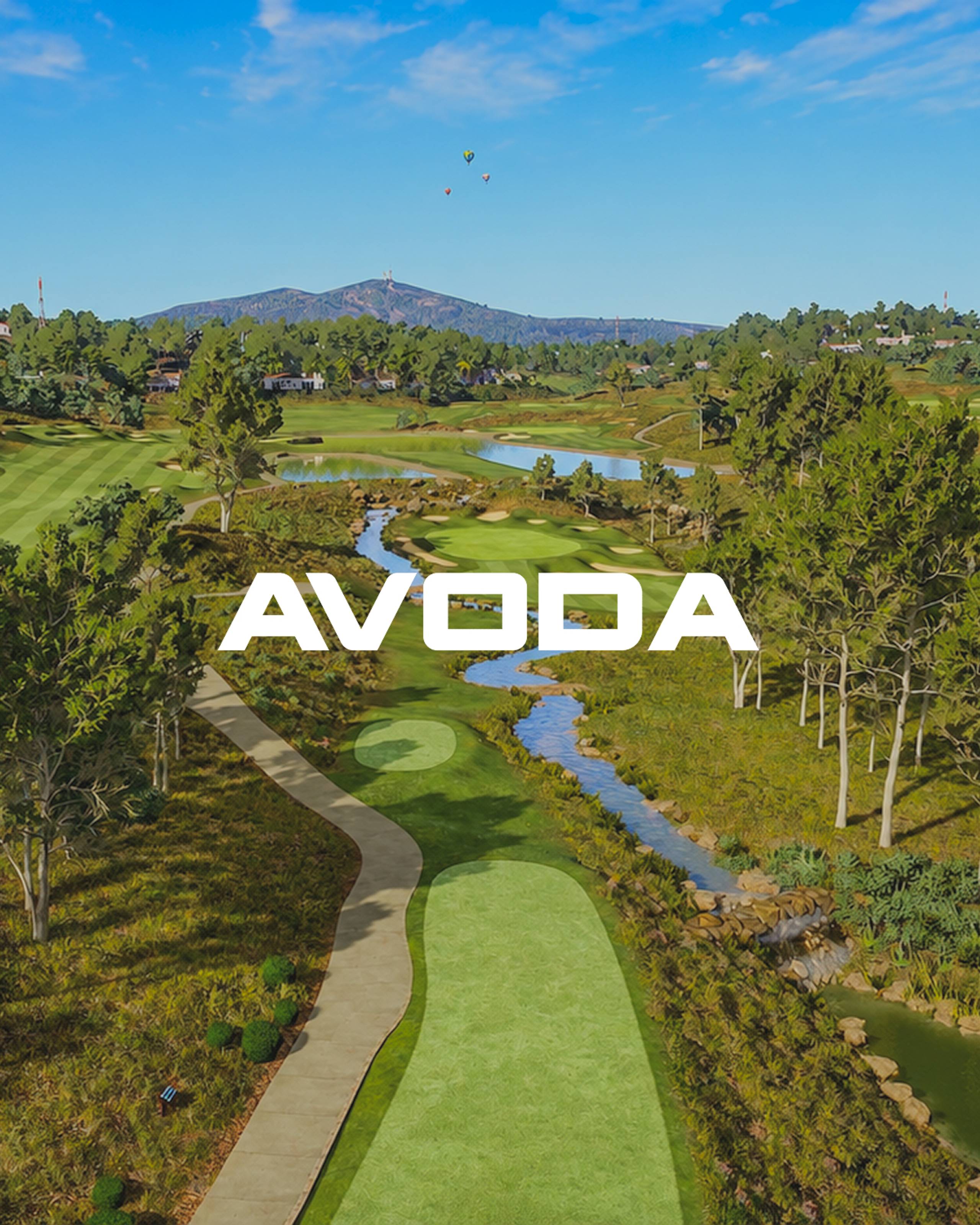 An aerial view of a scenic golf course with a stream, trees, and ponds, under a blue sky with hot air balloons, with the text "AVODA" overlaid in white.