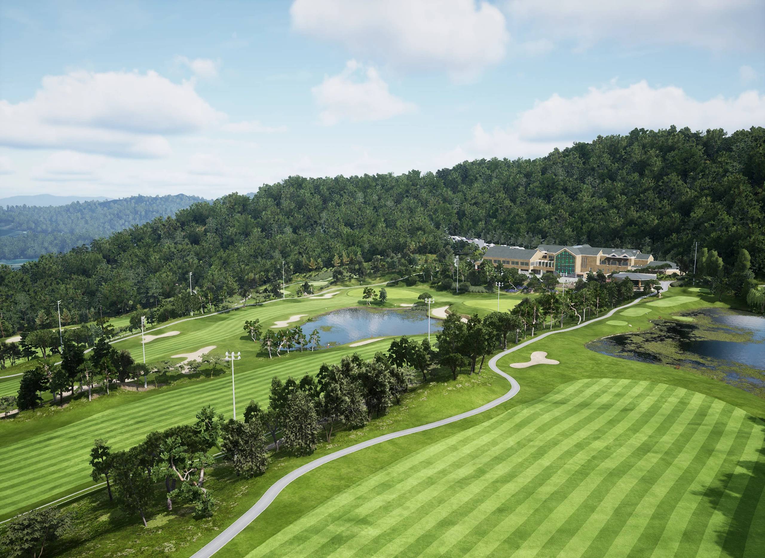 Aerial view of a golf course featuring green fairways, lakes, sand traps, and a large clubhouse, surrounded by dense forested hills.