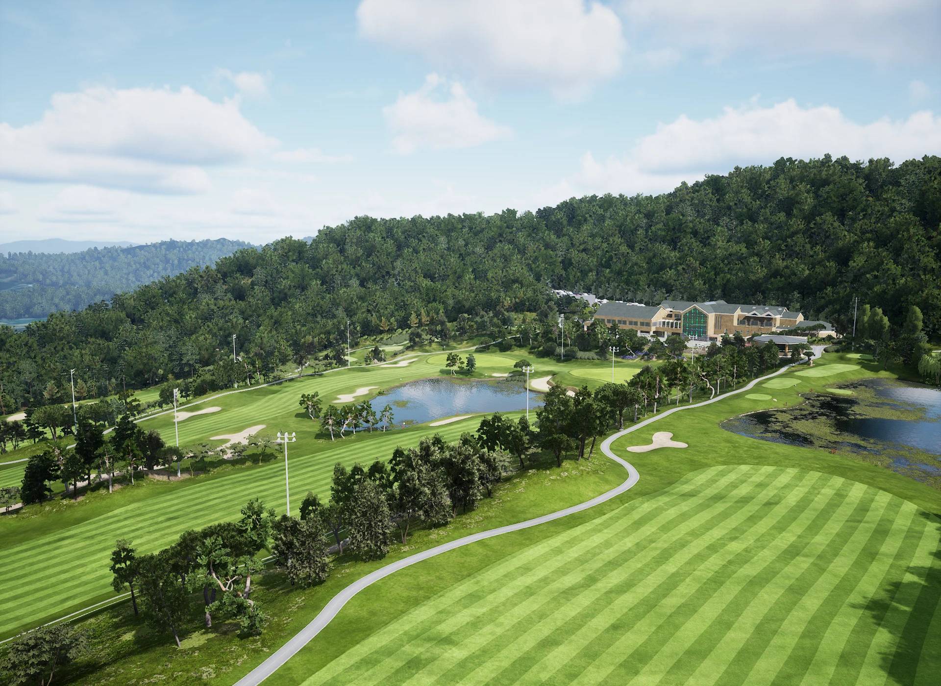 Aerial view of a golf course featuring green fairways, lakes, sand traps, and a large clubhouse, surrounded by dense forested hills.