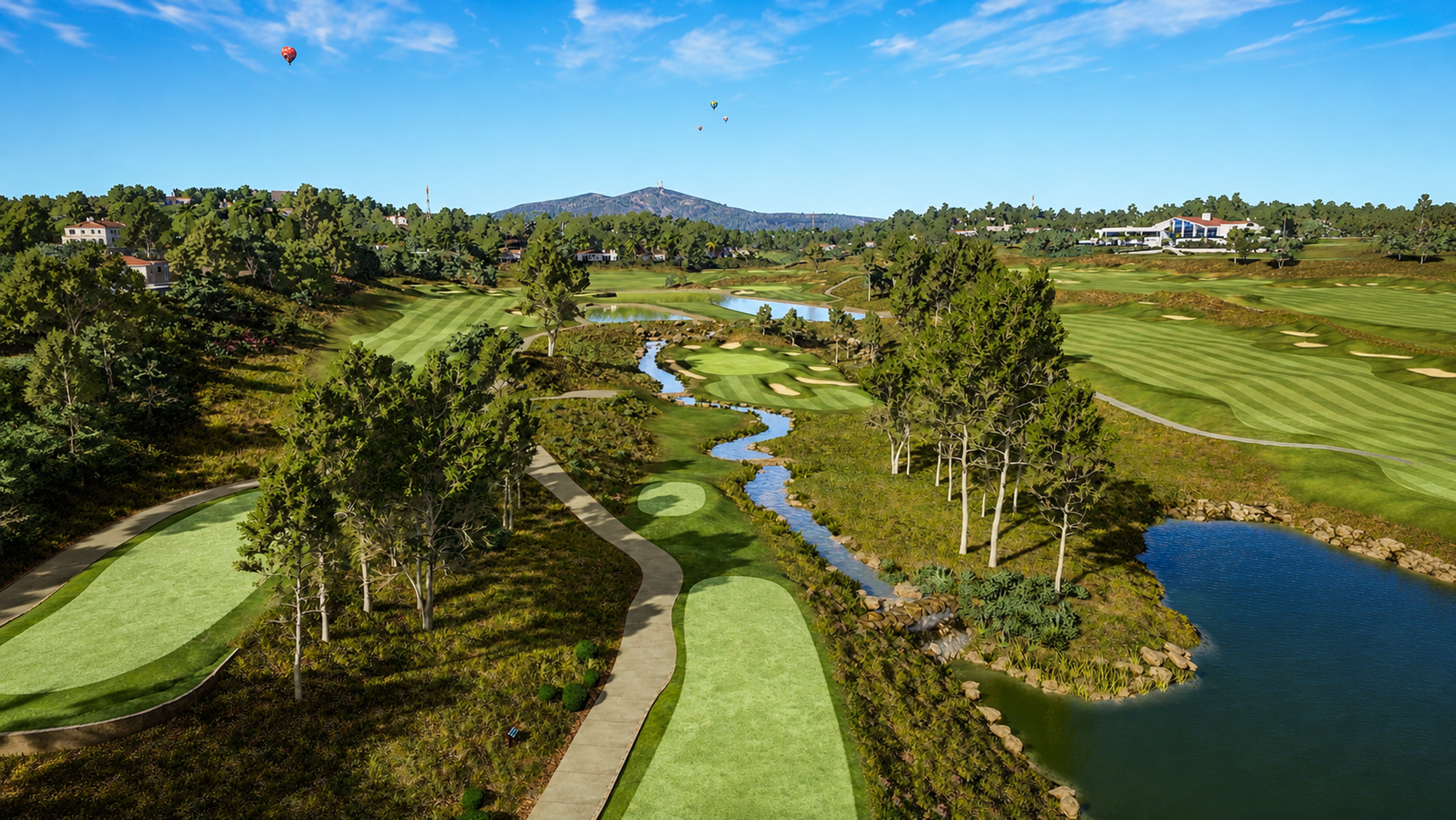 Aerial view of a lush golf course with fairways, water features, a clubhouse, and hot air balloons under a blue sky.