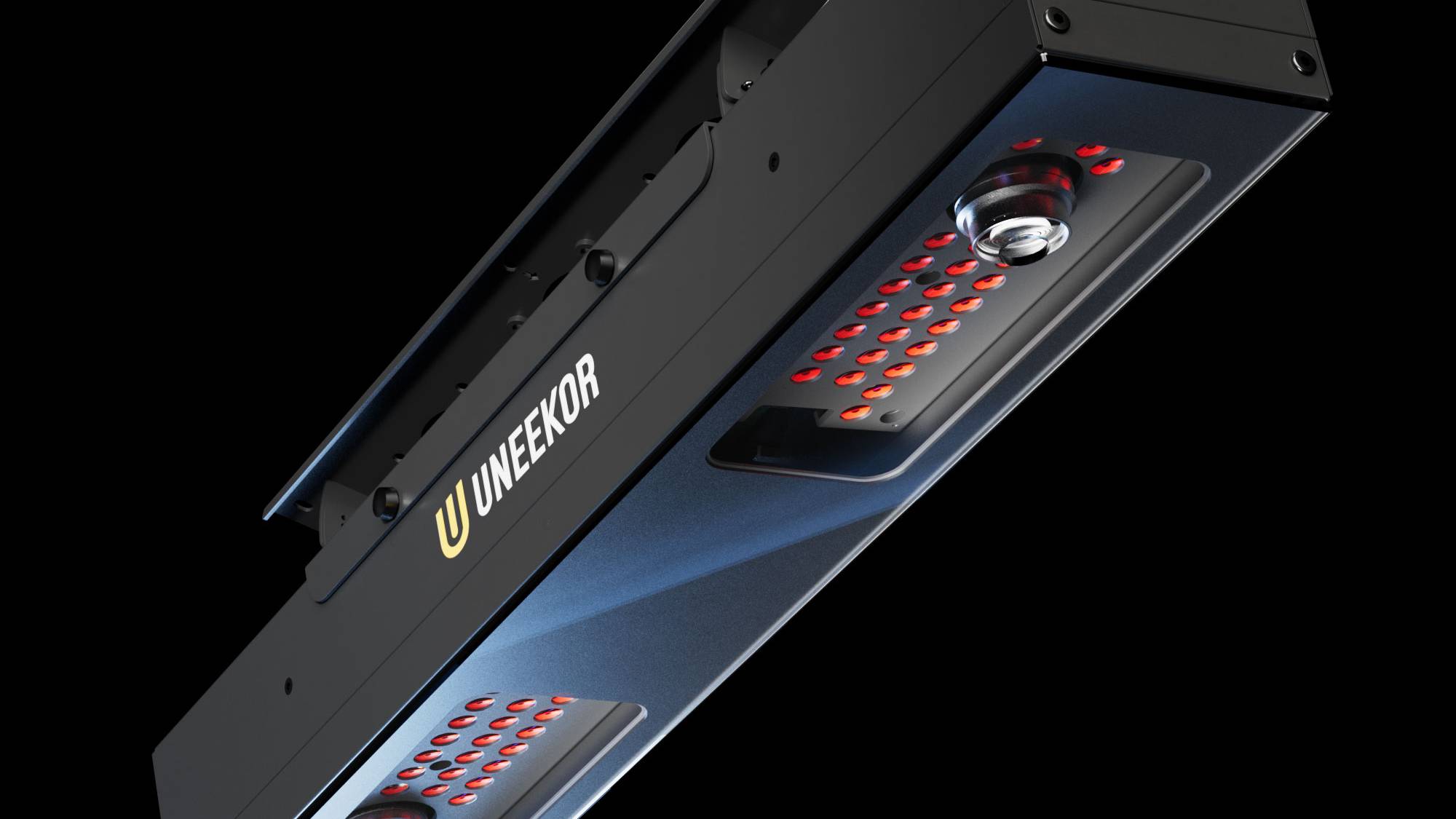 Black Uneekor golf launch monitor with two lenses and red sensor lights.