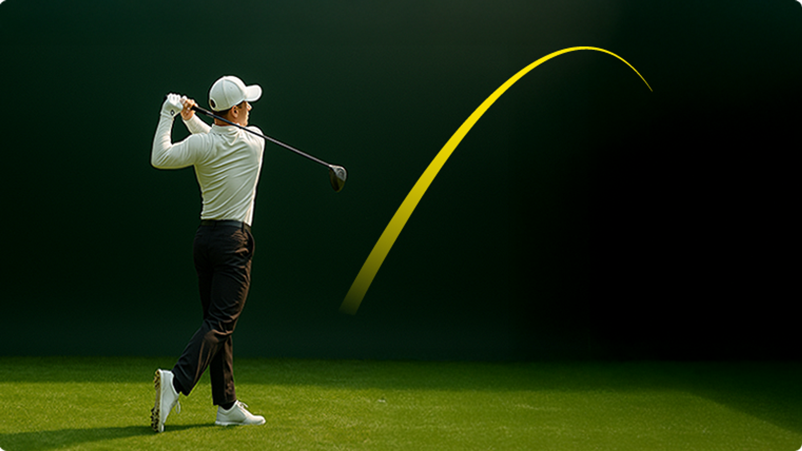Golfer in follow-through with a driver, yellow arc showing the ball's trajectory against a dark background.