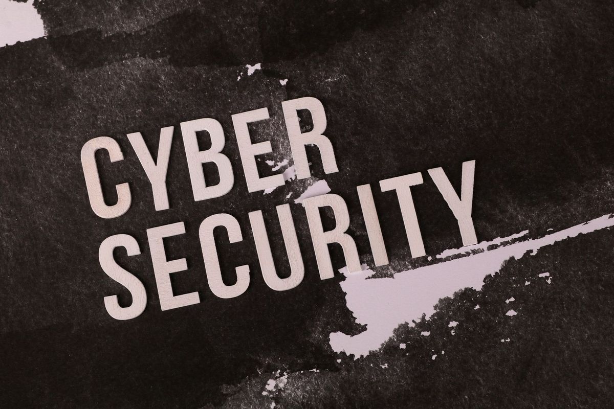 Cyber security concept shown on grunge-style background highlights the importance of digital protection.
