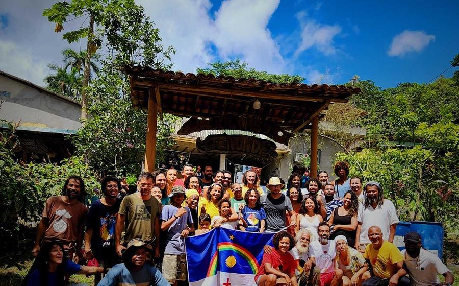 Group gathering at the entrance of Kilombo Tenonéd