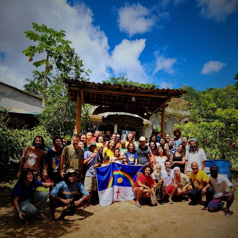 Group gathering at the entrance of Kilombo Tenonéd