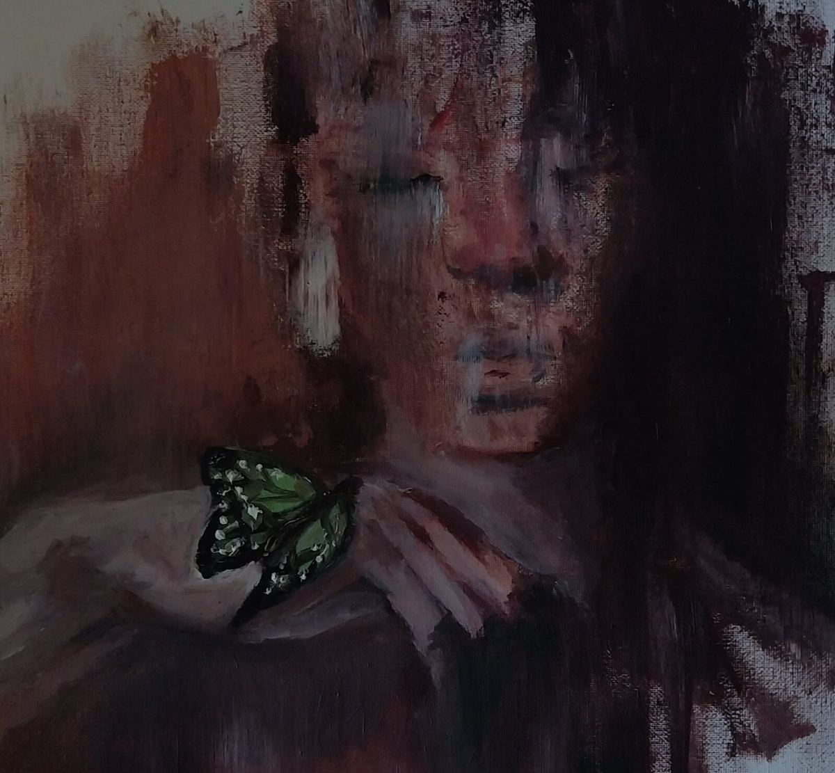 Hazy portrait with a green butterfly in muted red and black
