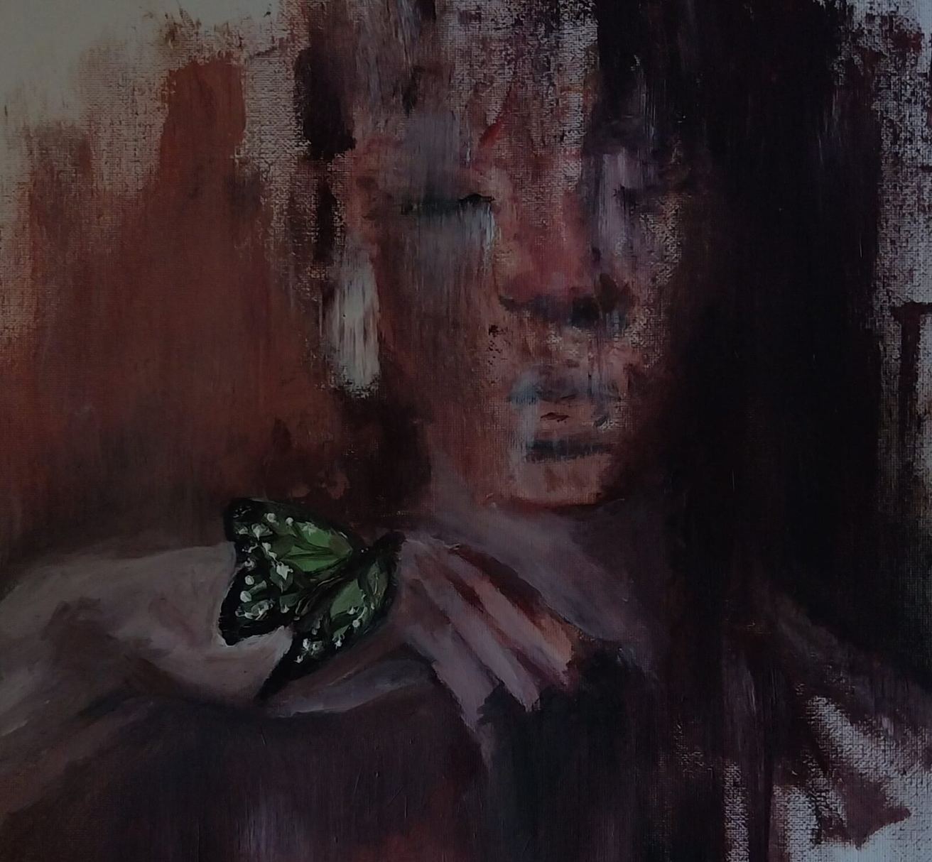 Hazy portrait with a green butterfly in muted red and black
